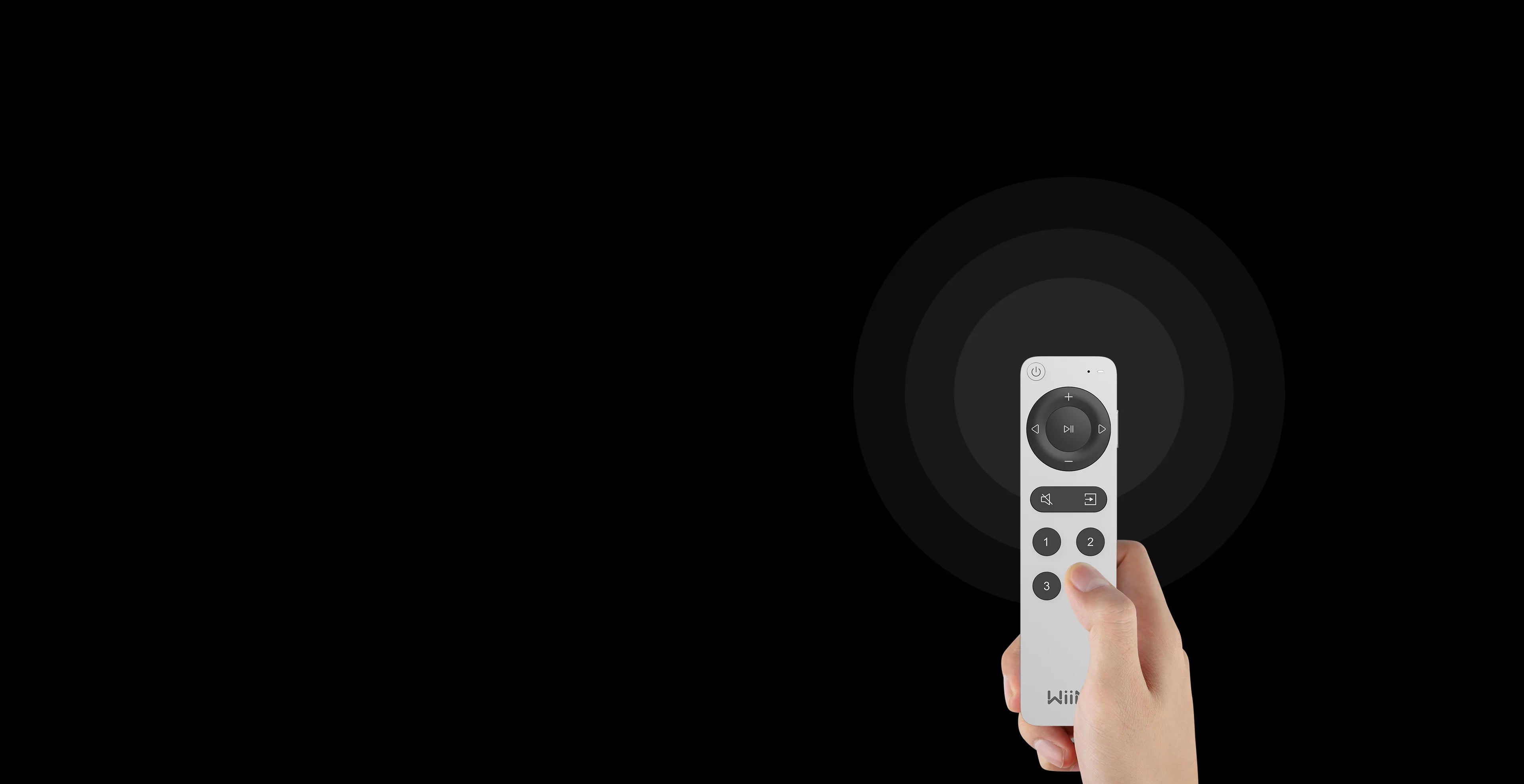 Hand holding WiiM remote control with wireless Bluetooth connectivity signal