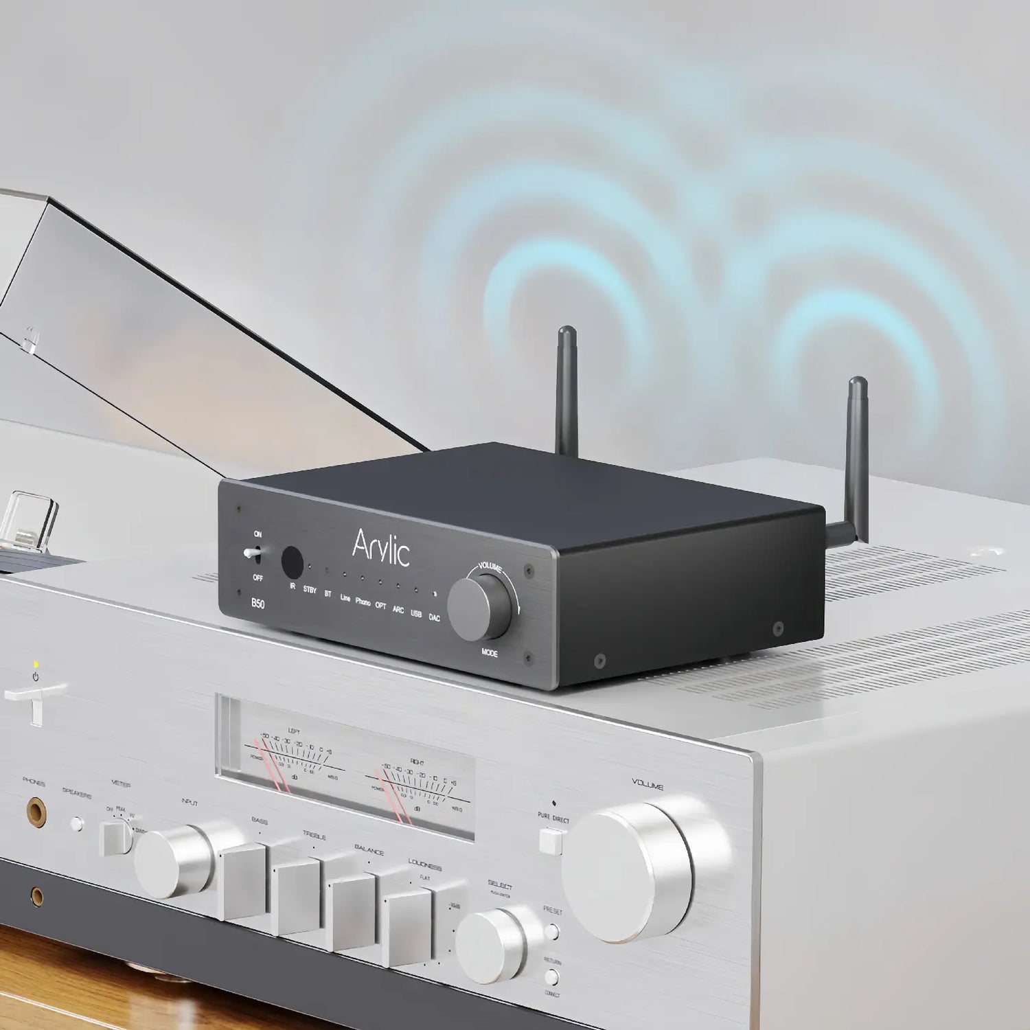 Arylic B50 Bluetooth amplifier paired with vintage audio equipment, supporting wireless connection and Hi-Fi music playback, compatible with modern and classic audio systems.