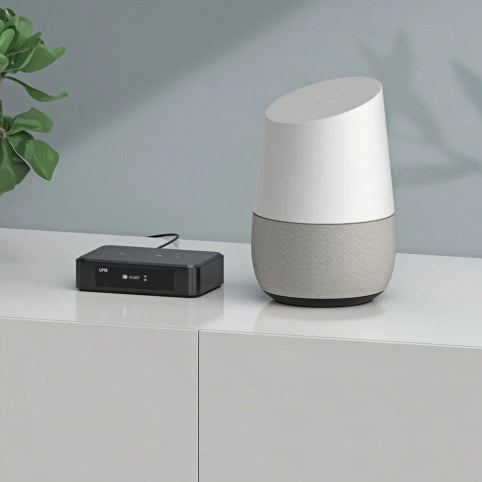 Arylic LP10 audio streaming device connected with Google Home smart speaker in a modern home setup