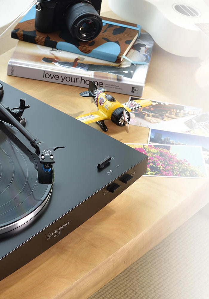 <h4>/ Analog or Bluetooth® Connectivity</h4><h1>High-Fidelity<br/>Audio</h1>